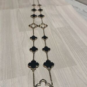 Elegant Black and Gold Clover Necklace
